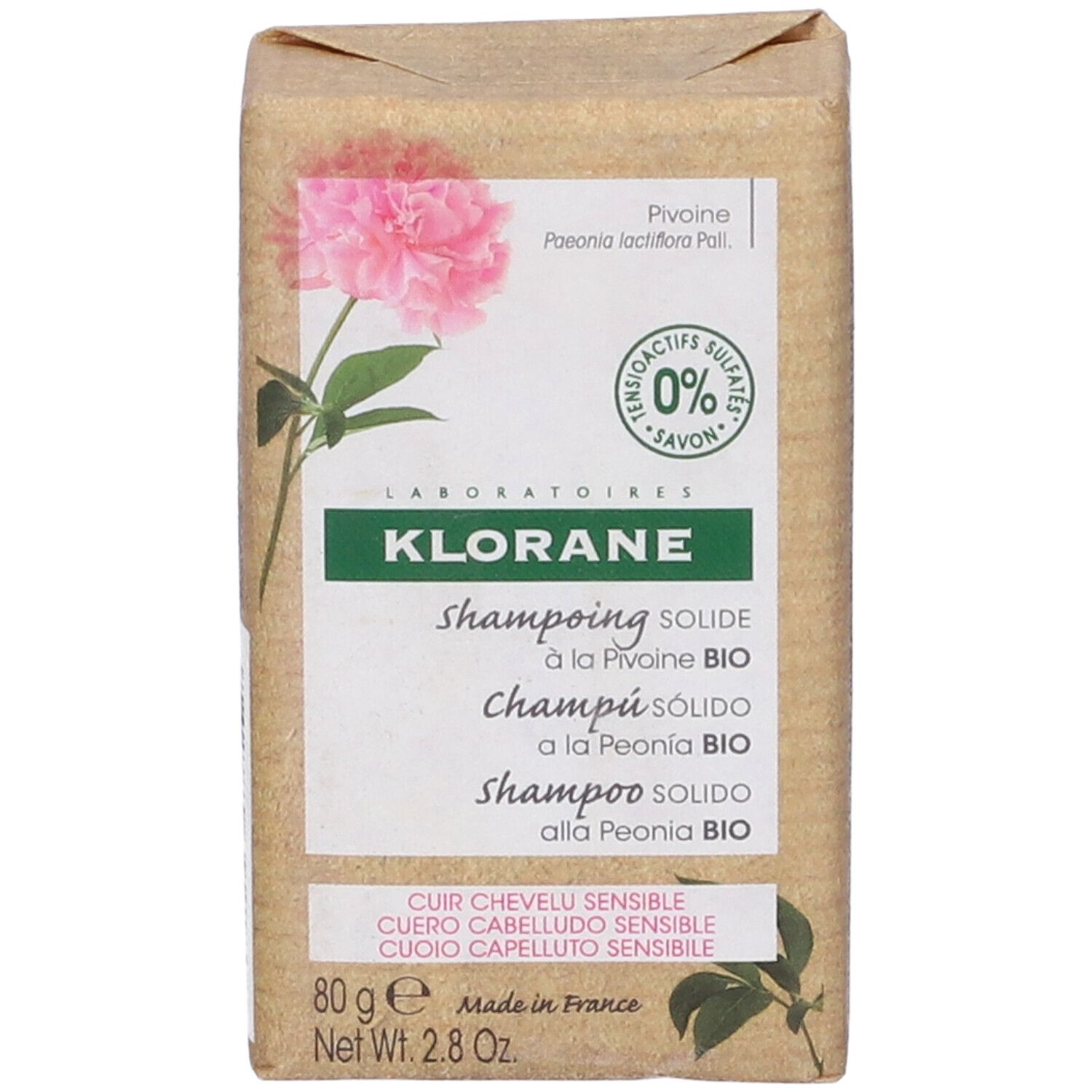 Klorane shampoo solido, confezione con fiore di peonia. Scritto: Shampoo solido, 80g, cuoio capelluto sensibile.
