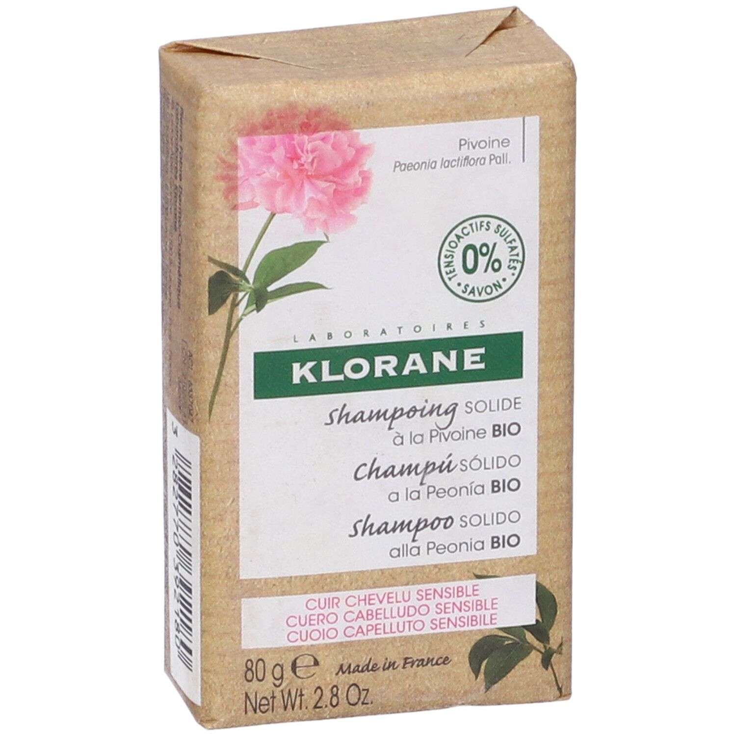 Klorane shampoo solido, confezione con fiore di peonia. Scritto: Shampoo solido, 80g, cuoio capelluto sensibile.