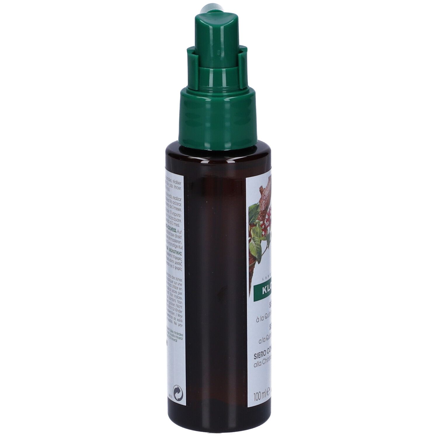 Flacone marrone con erogatore verde. Etichetta con informazioni prodotto. Retro con testo e logo.