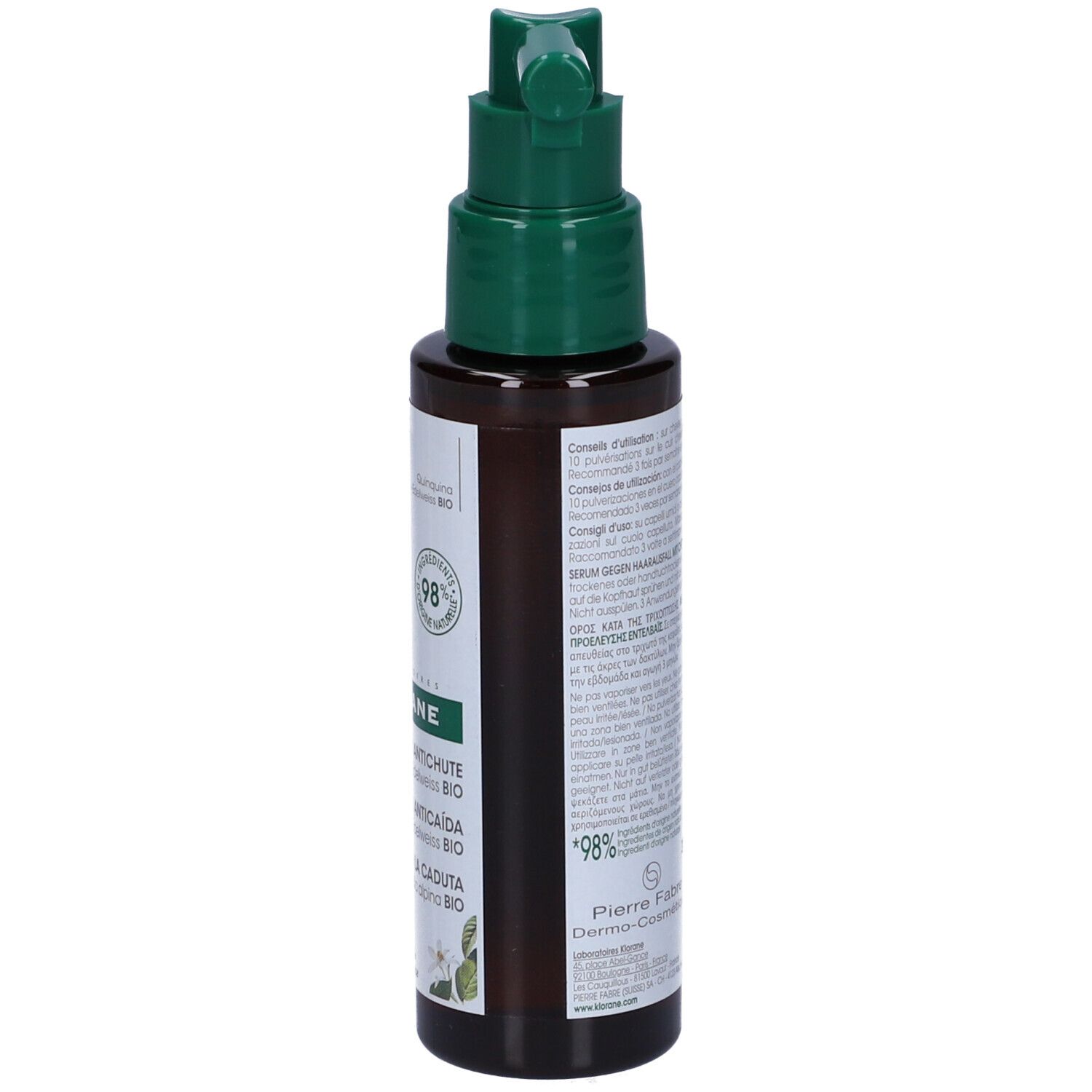 Flacone marrone con erogatore verde. Etichetta con informazioni prodotto. Retro con testo e logo.