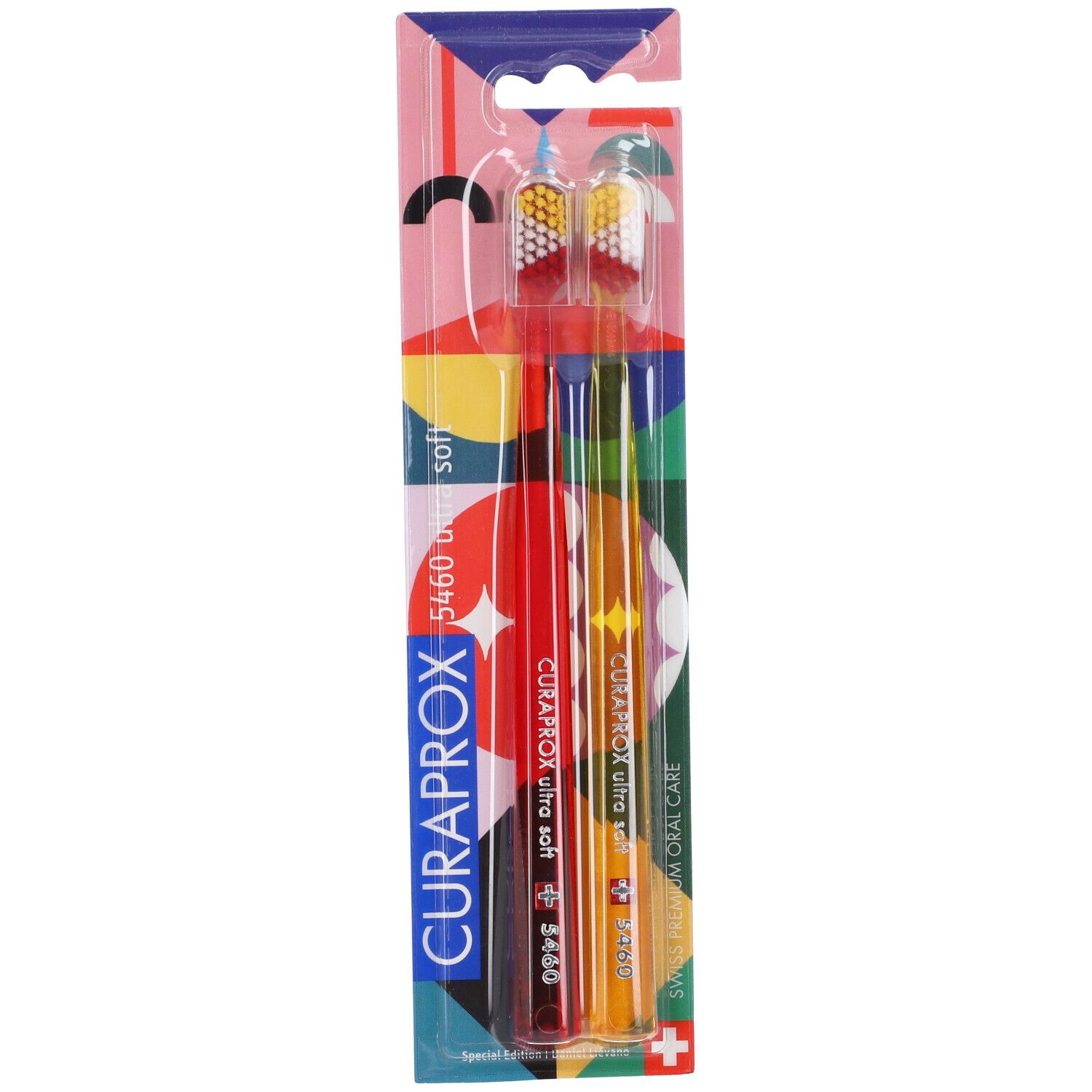 Due spazzolini in confezione. Manici: rosso, arancione, verde. Setole: giallo, bianco. Testo: CURAPROX, 5460 ultra soft.