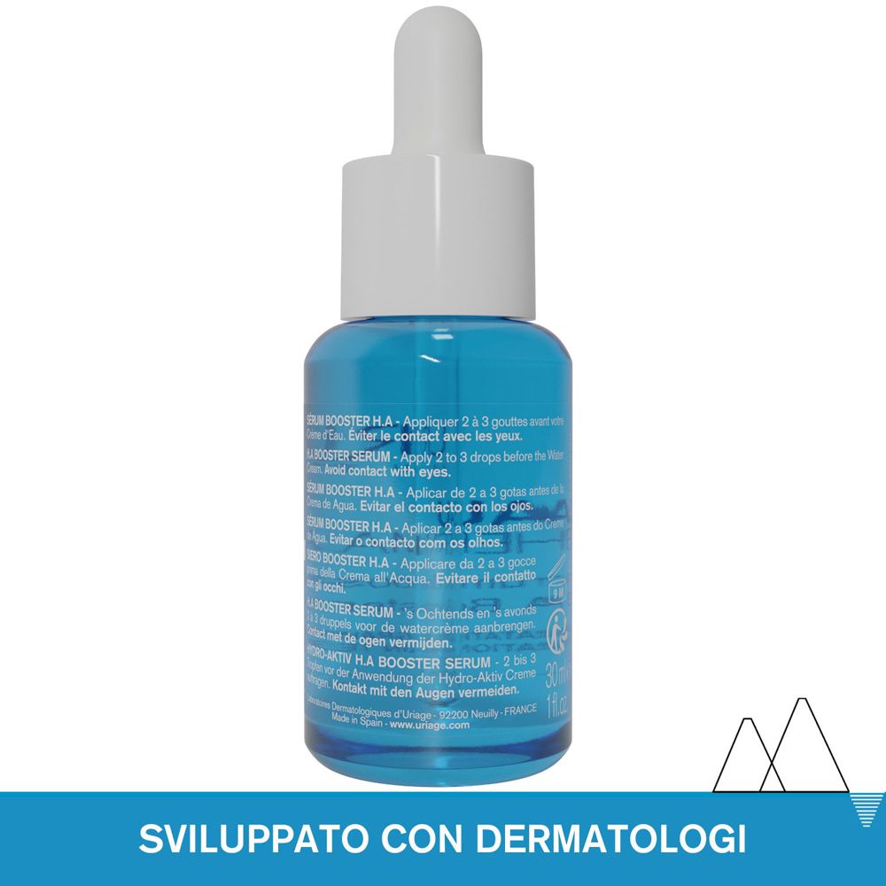 Retro del flacone di siero blu con tappo bianco. Testo multilingue. Scritta: URIAGE.