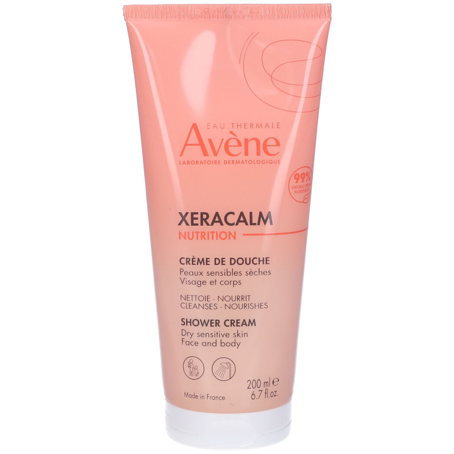 Tubo rosa con tappo bianco. Scritte: Eau Thermale Avène, XeraCalm Nutrition, Crème de Douche. Per pelli secche.
