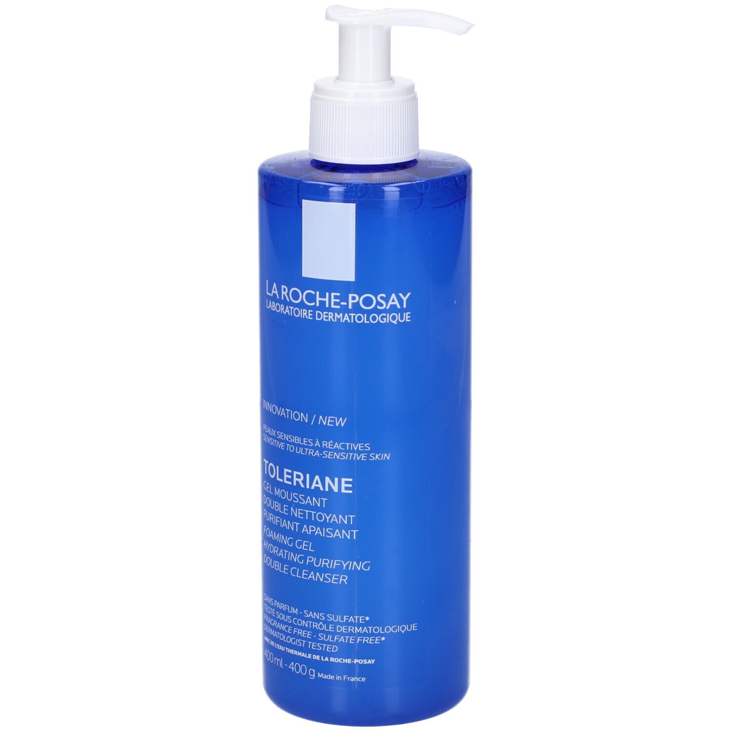Flacone blu con dosatore bianco. Etichetta con nome e informazioni. Testo: Toleriane Gel Moussant.