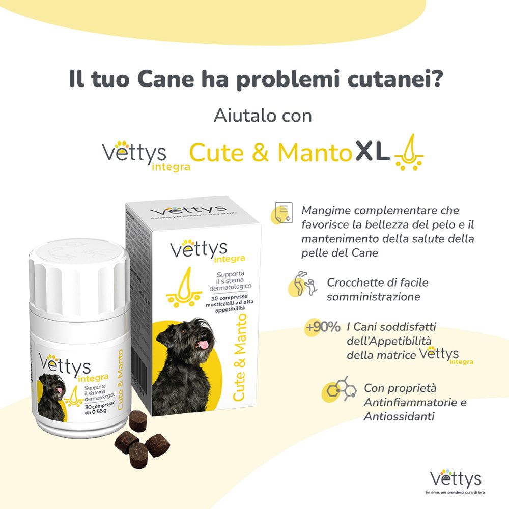 Confezione del prodotto con compresse. Testo: Vettys Integra Cute & Manto XL. Immagine di un cane.