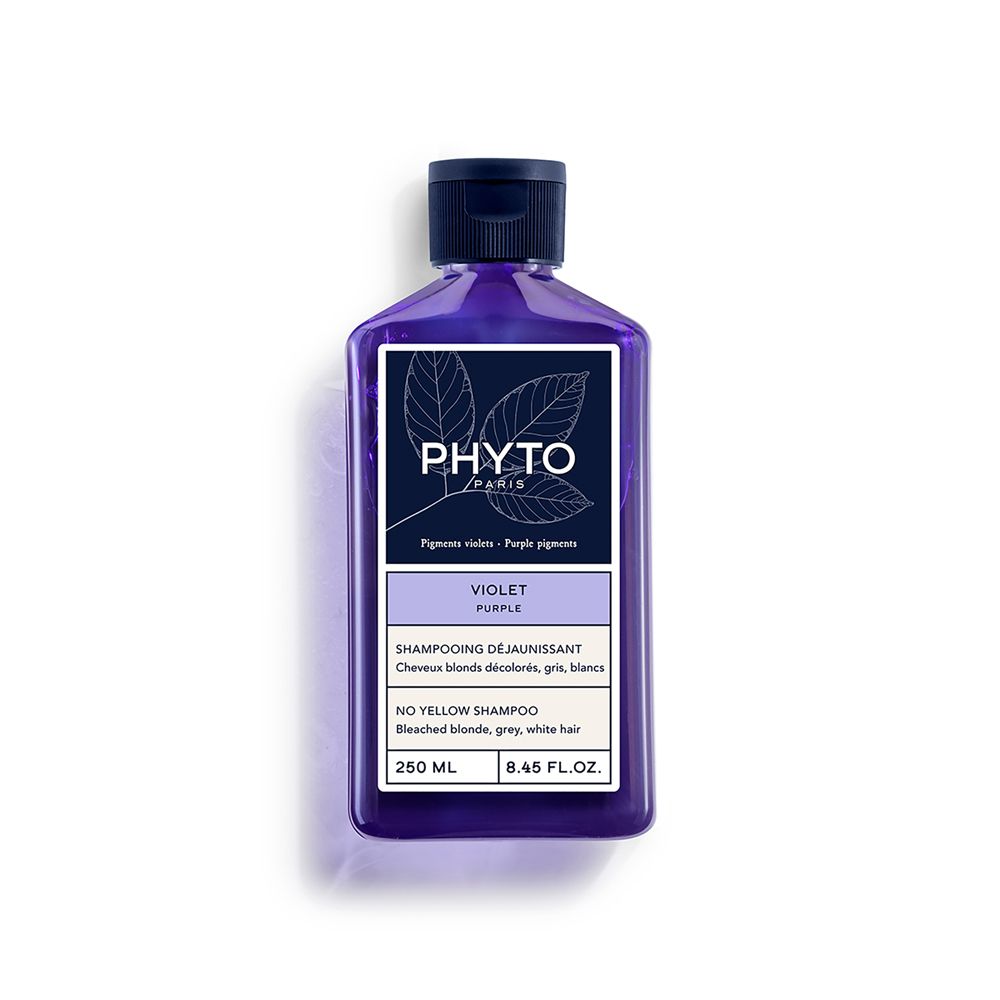 Shampoo viola Phyto Paris. Flacone con tappo blu scuro ed etichetta. Testo: Violet, Shampooing Déjaunissant, 250 ml, 8.45 FL.OZ.