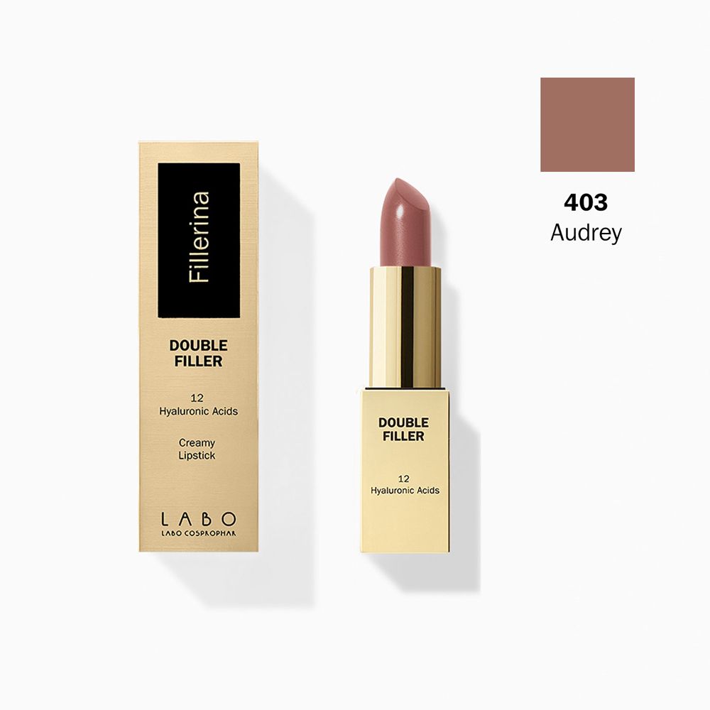 Rossetto con confezione. Rossetto dorato, tonalità rosa. Confezione con informazioni sul prodotto.