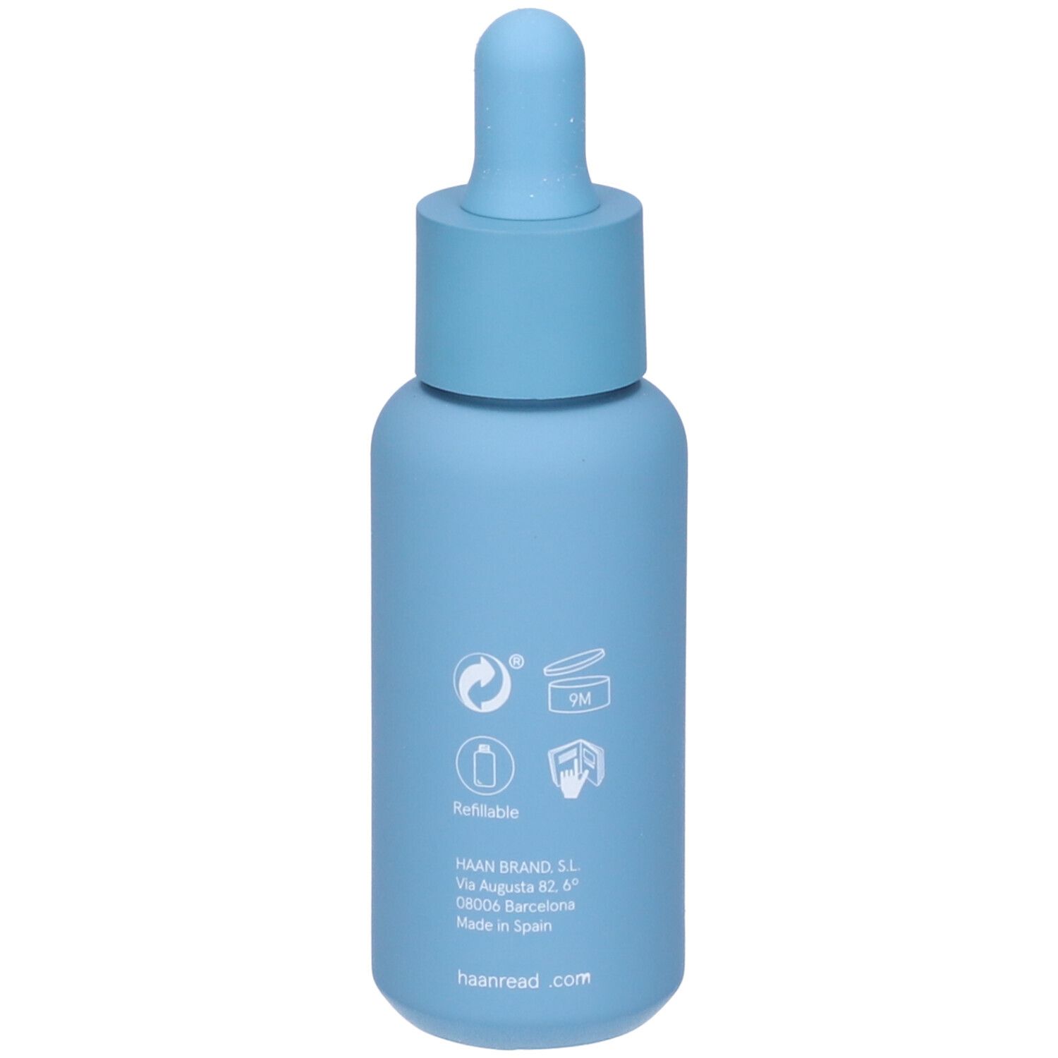 Flacone azzurro con contagocce. Scritta: HAAN, Ricaricabile, indirizzo. Informazioni sugli ingredienti e l'origine.