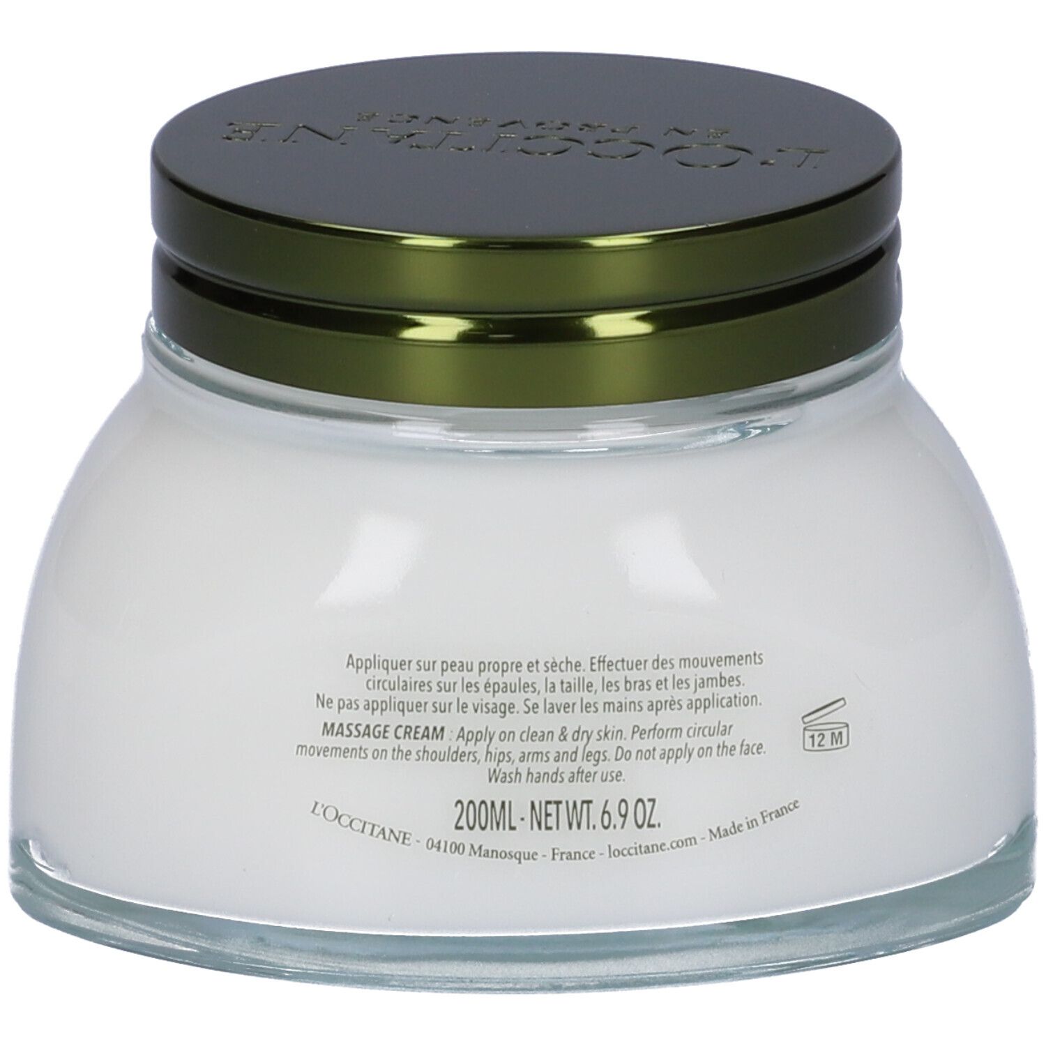 Vasetto in vetro con crema bianca e coperchio verde. Scritta: Massage Cream, 200ml, 6.9 oz.