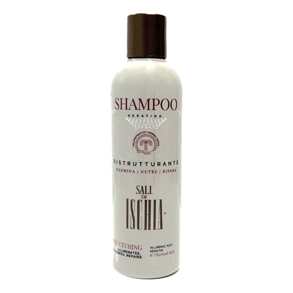Flacone di shampoo beige con tappo marrone. Scritte: Shampoo, Keratina, Ristrutturante, Sali di Ischia. Testo in italiano.