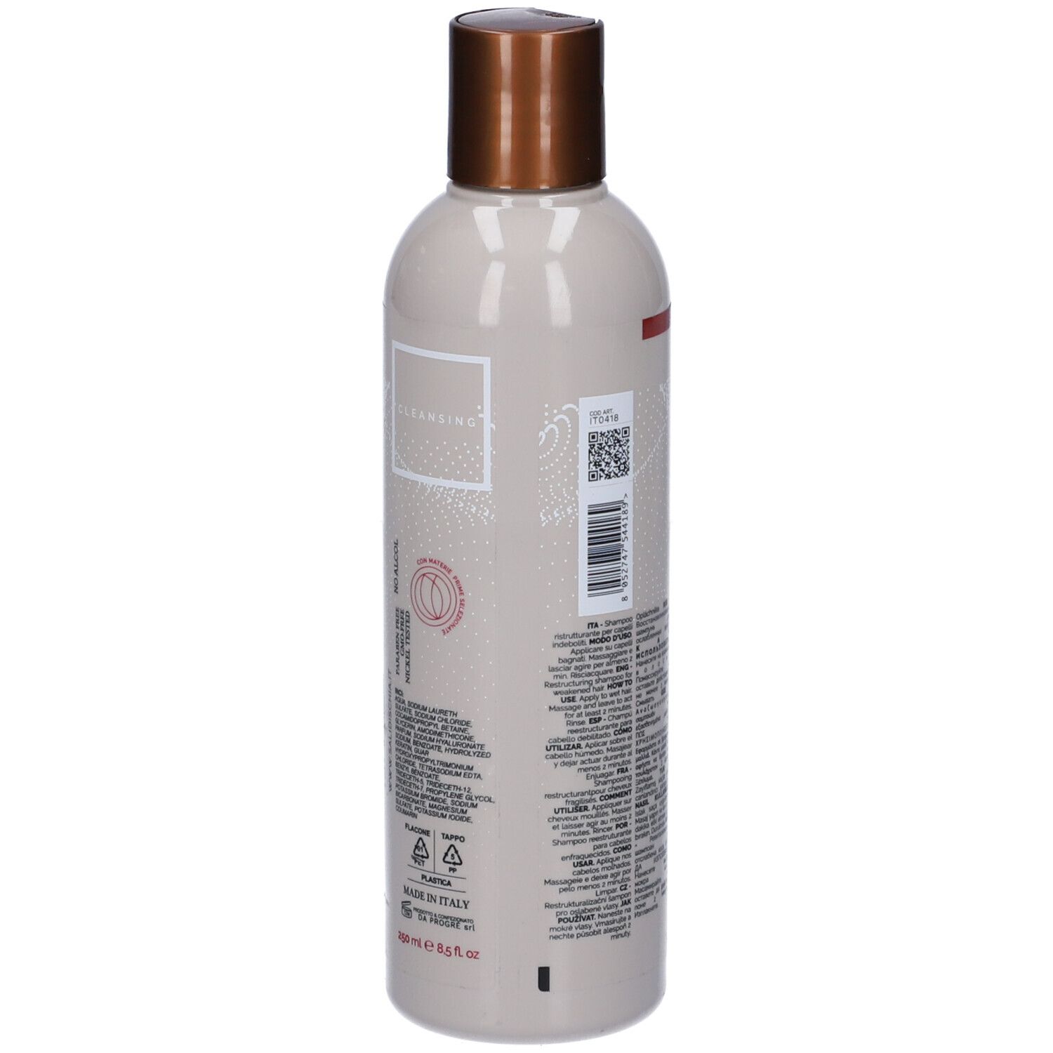 Flacone di shampoo beige con tappo marrone. Scritte: Shampoo, Keratina, Ristrutturante, Sali di Ischia. Testo in italiano.