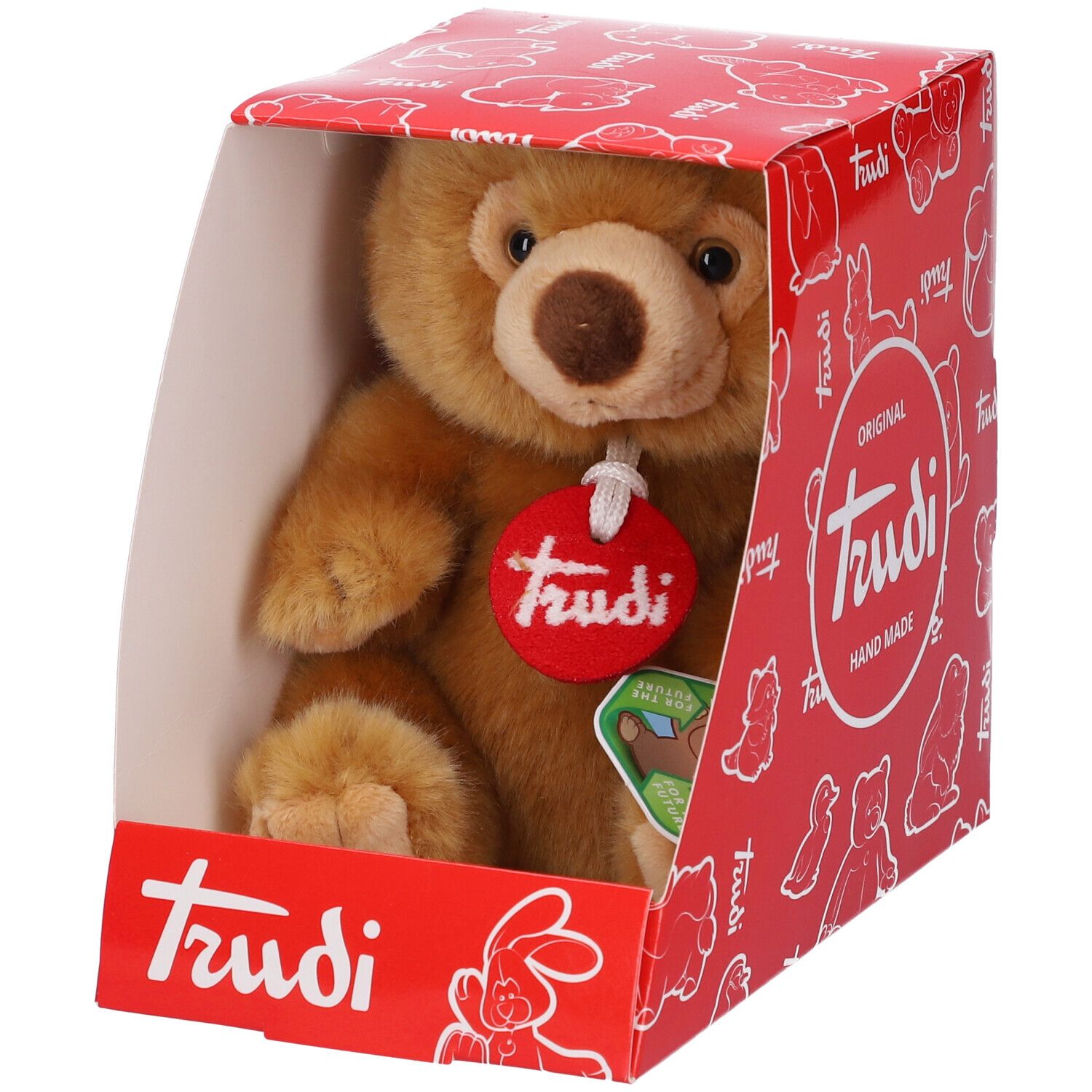 Orsetto marrone in confezione rossa. Etichetta rossa con logo "Trudi". Confezione con illustrazioni di orsi e logo "Trudi".