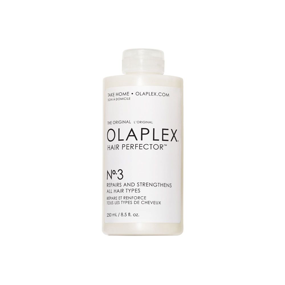 Olaplex Hair Perfector Nº3 Flasche. Weißes Etikett mit Produktnamen und Text. Transparente Flasche mit weißem Deckel.