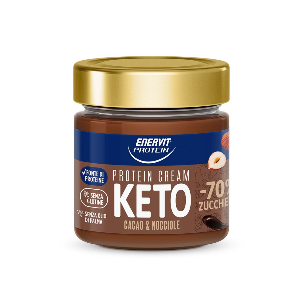 Glas mit Keto-Protein-Creme. Aufschrift: Enervit Protein, Keto, Cacao & Nocciole, -70% Zucker. Mit Haselnuss- und Kakaobohnen-Illustrationen.