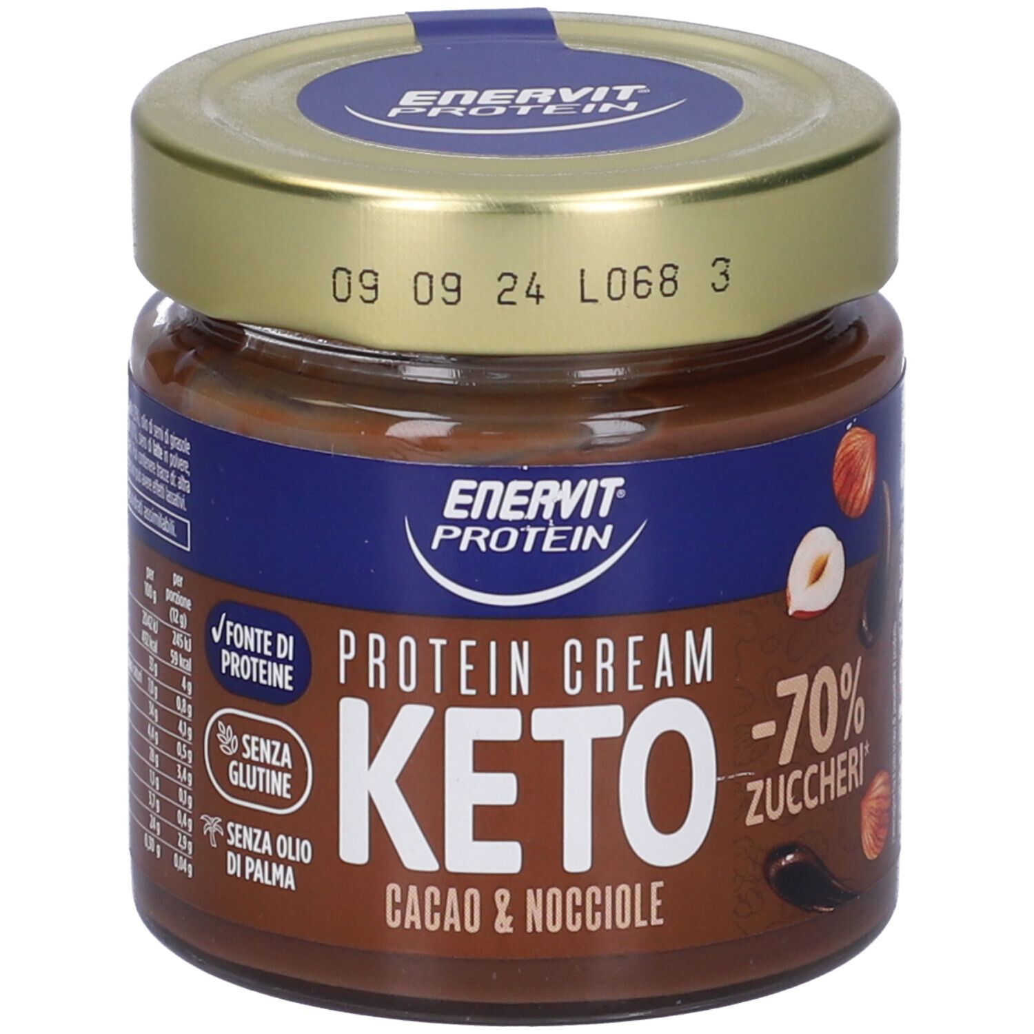 Glas mit Keto-Protein-Creme. Aufschrift: Enervit Protein, Keto, Cacao & Nocciole, -70% Zucker. Mit Haselnuss- und Kakaobohnen-Illustrationen. Datumsstempel.