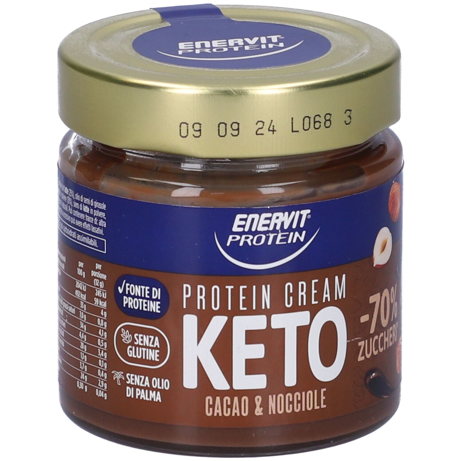 Glas mit Keto-Protein-Creme. Aufschrift: Enervit Protein, Keto, Cacao & Nocciole, -70% Zucker. Mit Haselnuss- und Kakaobohnen-Illustrationen. Datumsstempel.