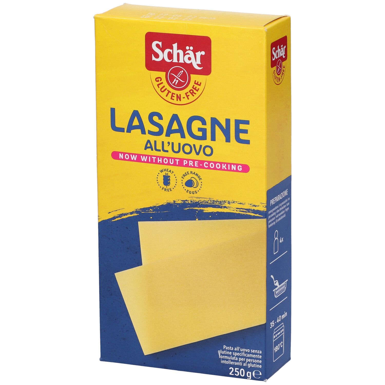 Scatola gialla di lasagne senza glutine. Scritto: Schär, Lasagne all'uovo, now without pre-cooking. Due fogli di lasagne visibili.