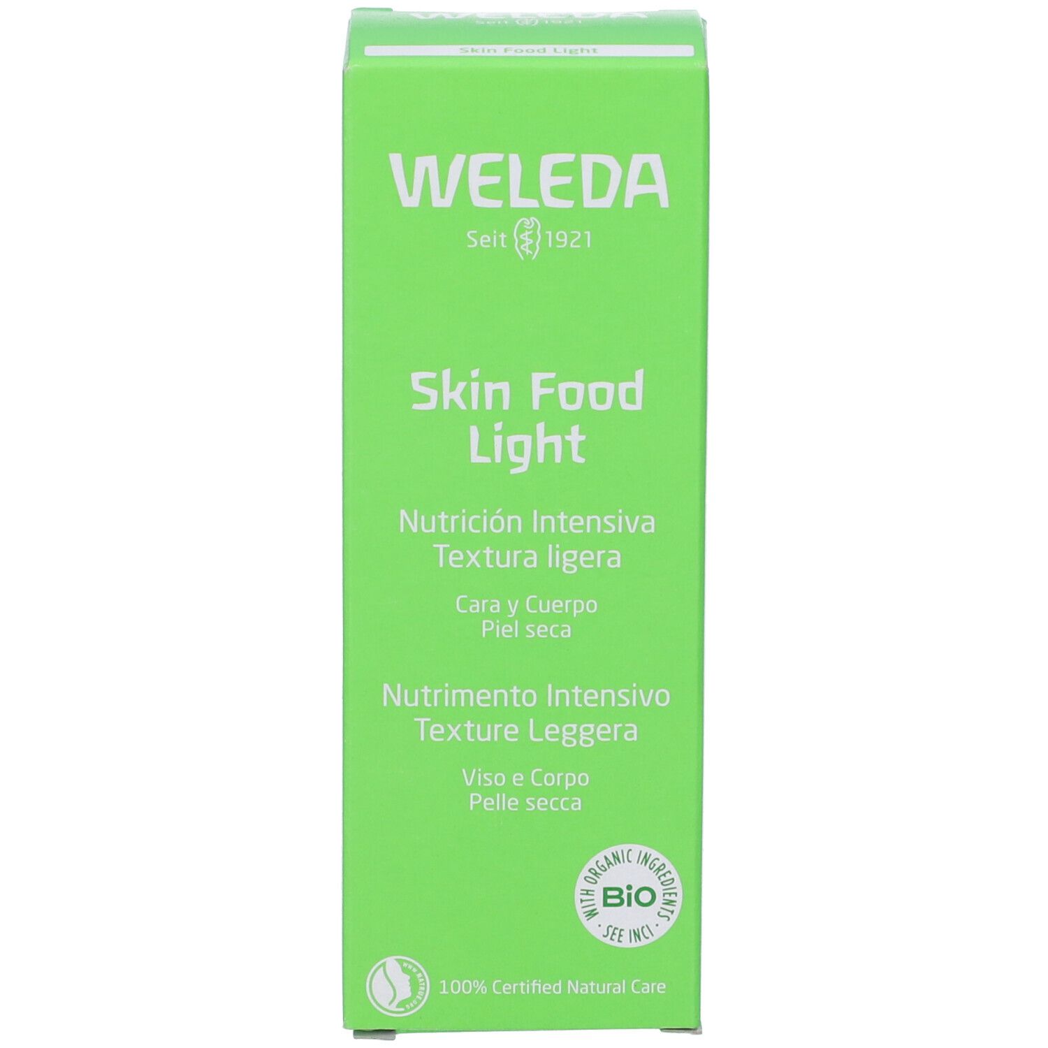 Scatola verde. Scritta: WELEDA, Skin Food Light. Testo multilingue. Con sigillo bio.