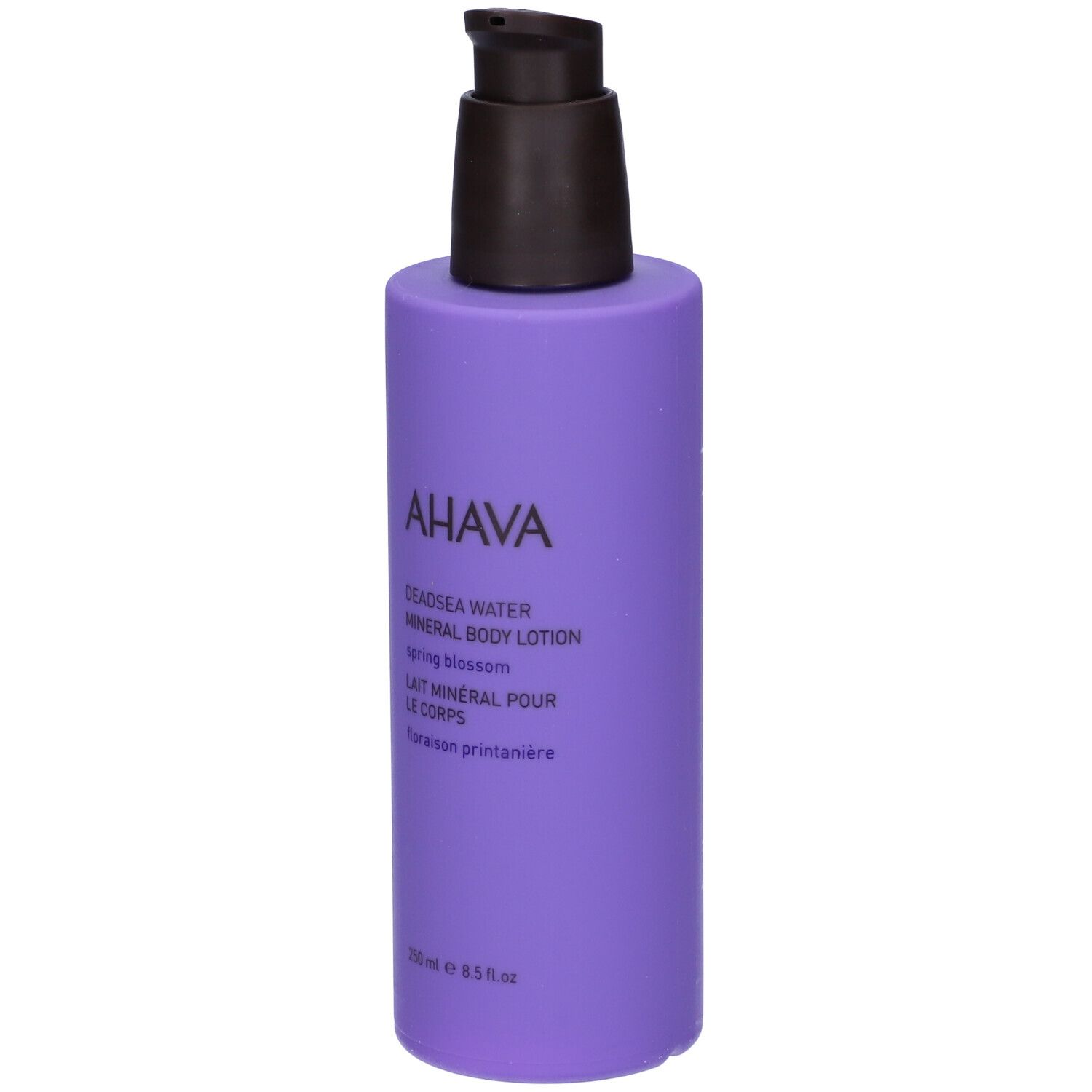 Flacone lilla con erogatore nero. Logo AHAVA e nome prodotto: Deadsea Water Mineral Body Lotion Spring Blossom.