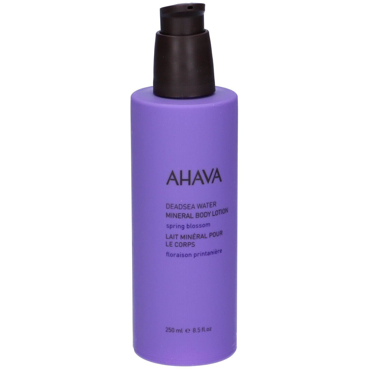 Flacone lilla con erogatore nero. Logo AHAVA e nome prodotto: Deadsea Water Mineral Body Lotion Spring Blossom.