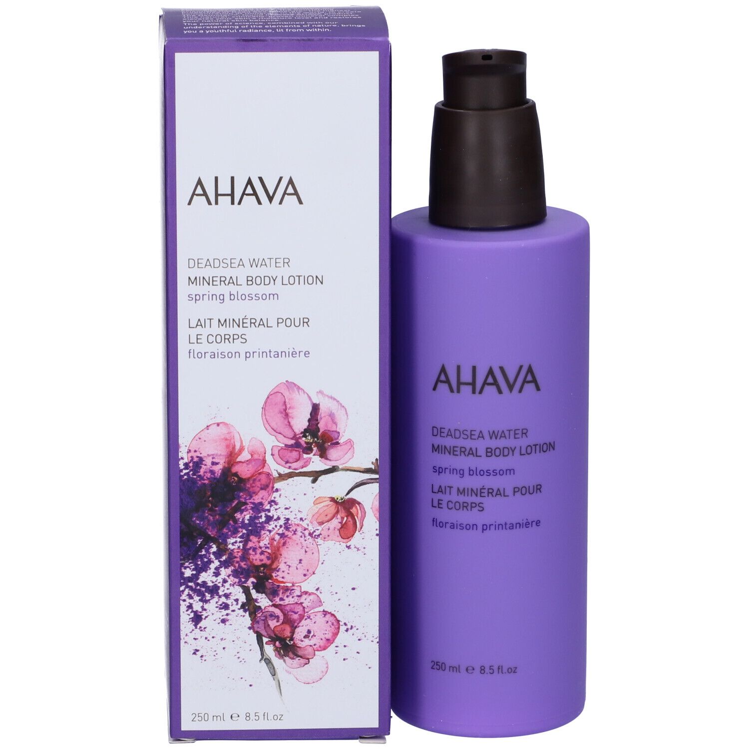 Flacone lilla e confezione. AHAVA Deadsea Water Mineral Body Lotion Spring Blossom. Design floreale.