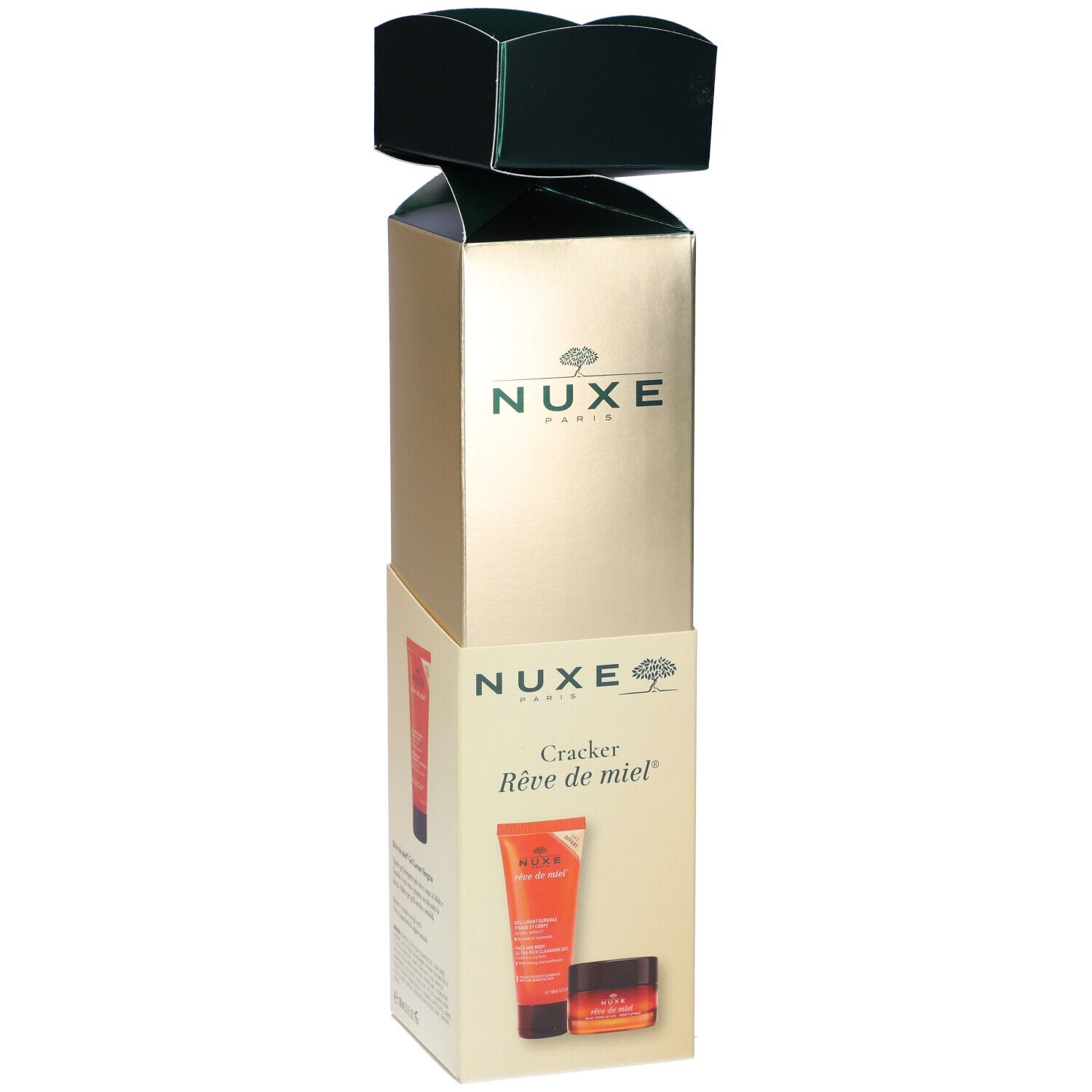 Confezione Nuxe con logo e nome del prodotto. Contiene un tubetto e un piccolo vasetto. Confezione dorata e verde.