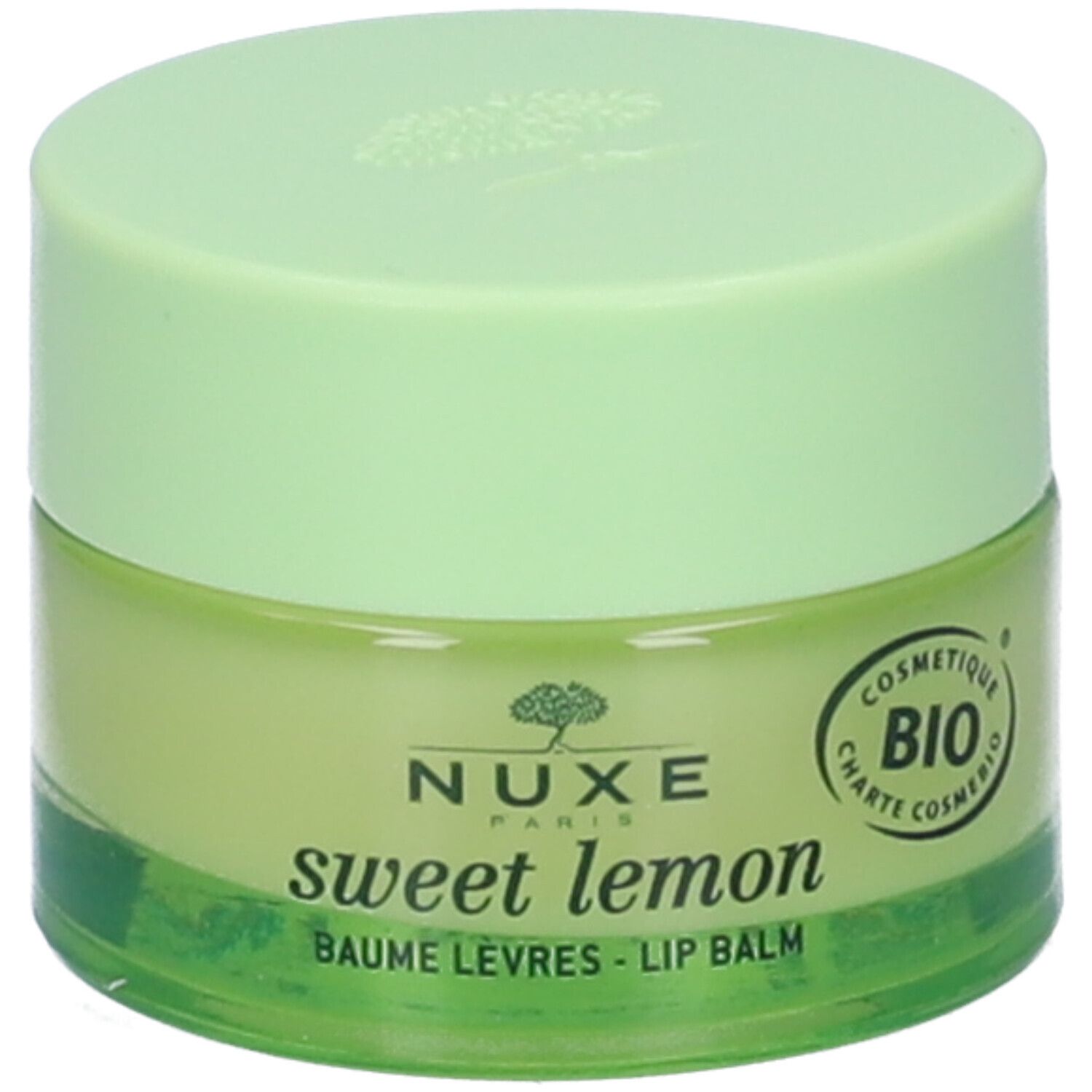 Vasetto verde di balsamo labbra. Scritta: Nuxe, sweet lemon, Baume Lèvres - Lip Balm. Certificazione Bio.