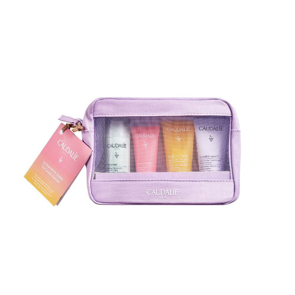 Pochette cosmetica lilla con inserto trasparente. Contiene quattro tubetti e un'etichetta con logo.