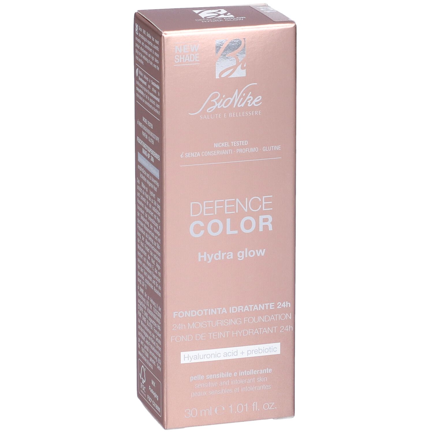 Scatola BioNike Defence Color Hydra Glow Fondotinta Idratante 24h. Informazioni prodotto e logo su sfondo rosa.