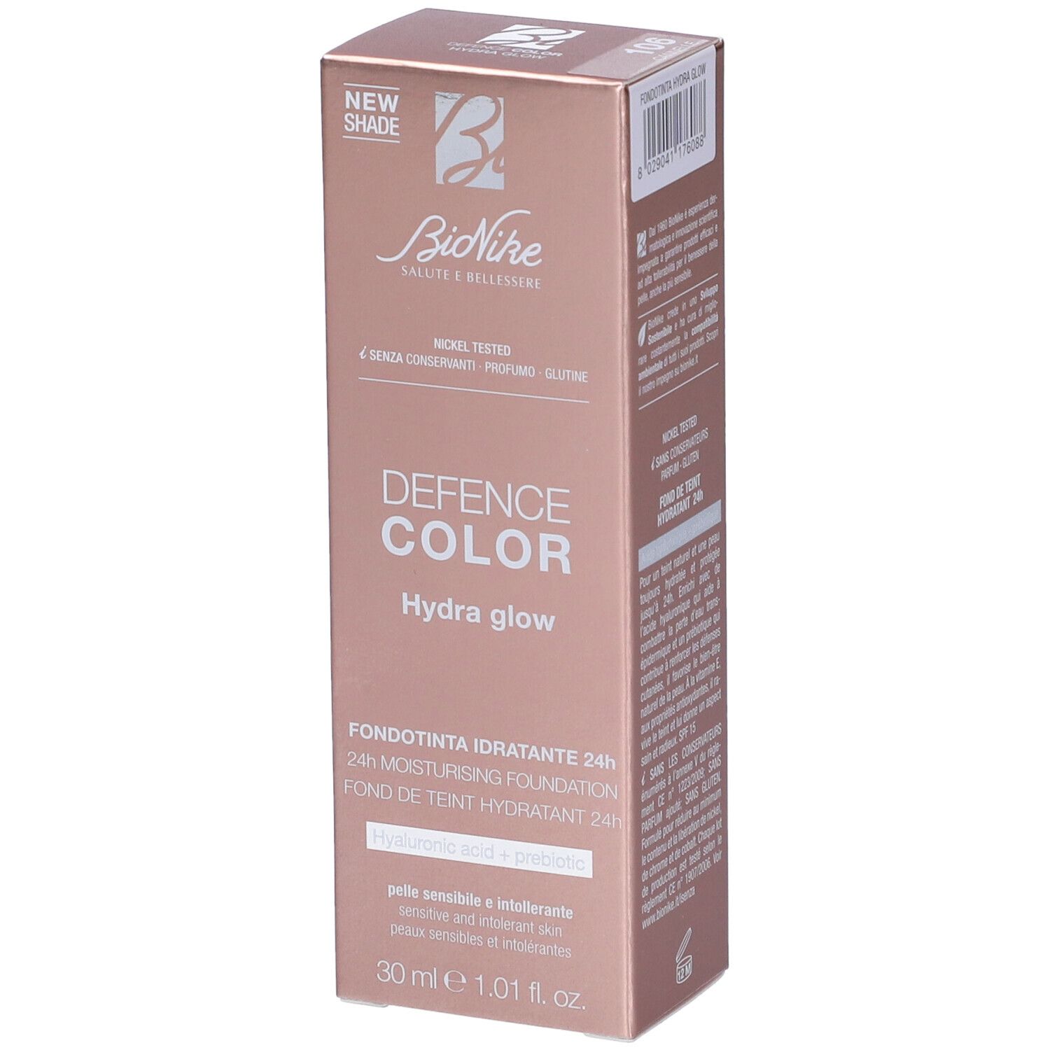 Confezione rosa dorato BioNike Defence Color Hydra Glow Fondotinta Idratante 24h. Nome e logo del prodotto visibili.