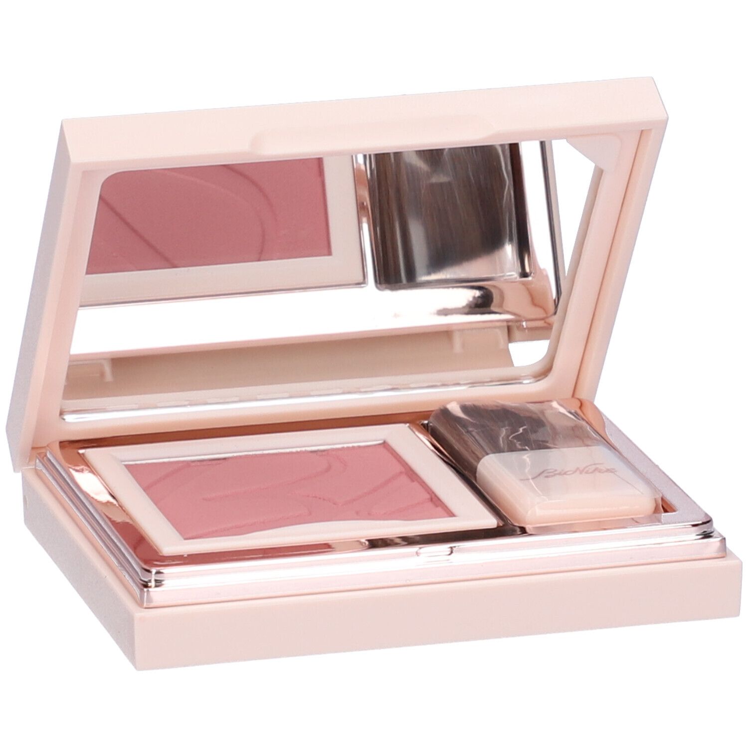 Fard compatto rosa con specchio e pennello. Astuccio rosa. Due quadrati di polvere.
