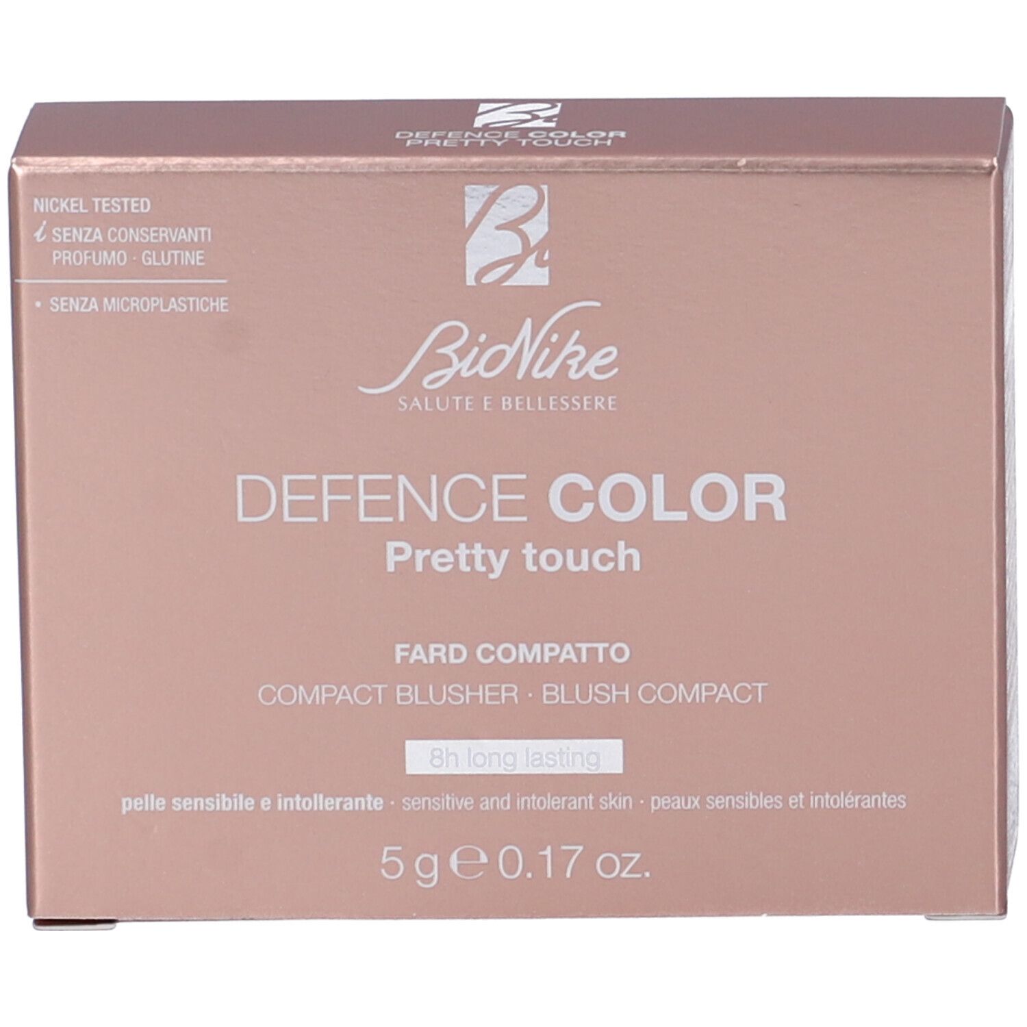 Confezione per fard compatto rosa. Marchio e nome del prodotto visibili. Testo sulla confezione.