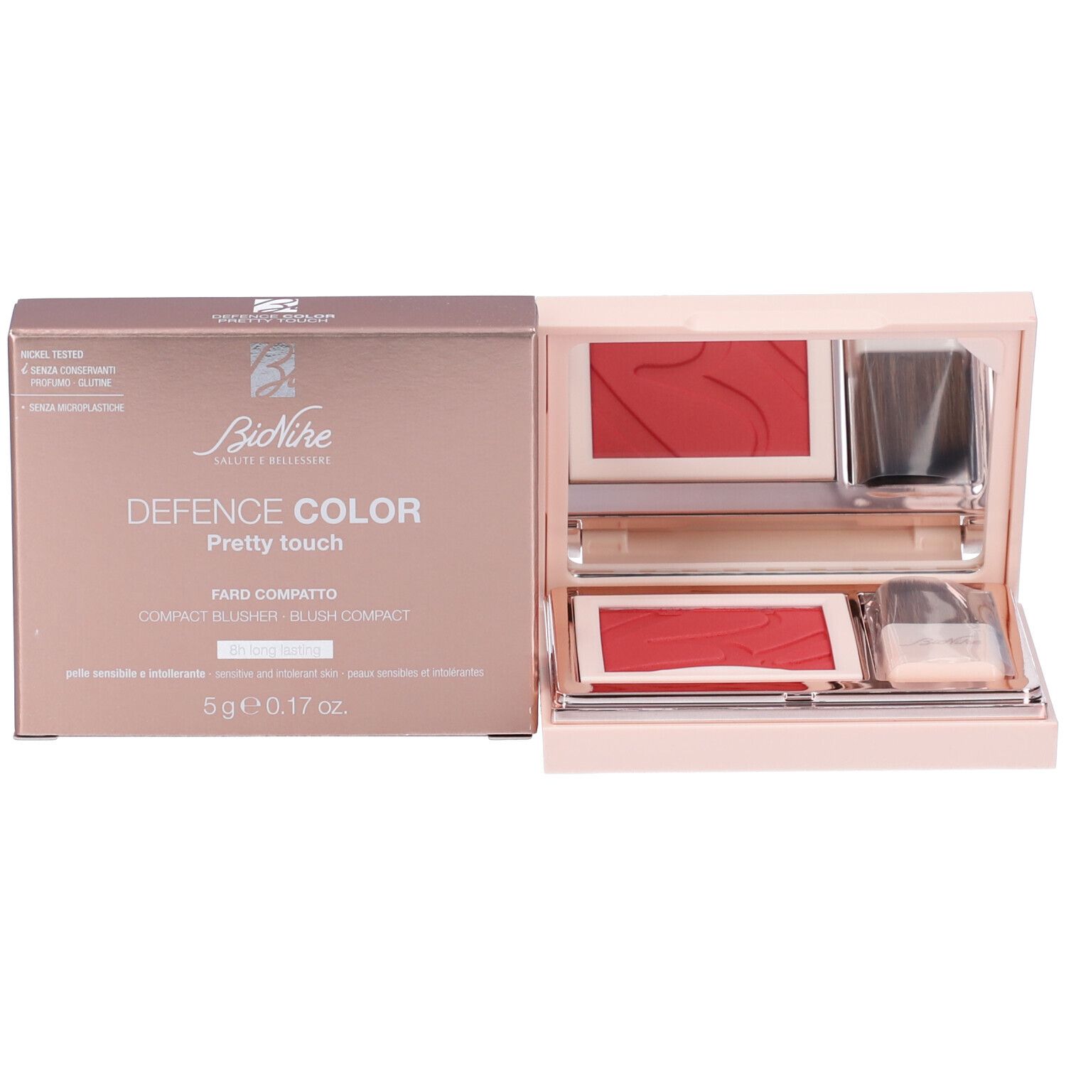 Confezione con fard. Scatola rosa e marrone, nome del prodotto e marchio visibili. Colore: rosso lampone.