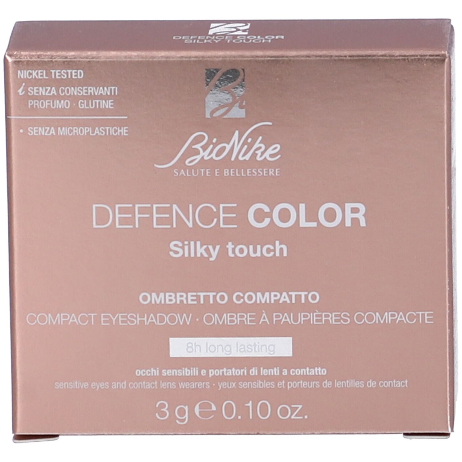 Confezione prodotto con ombretto. Tonalità rosa e marrone. Testo: Defence Color, Silky touch, Ombretto compatto.