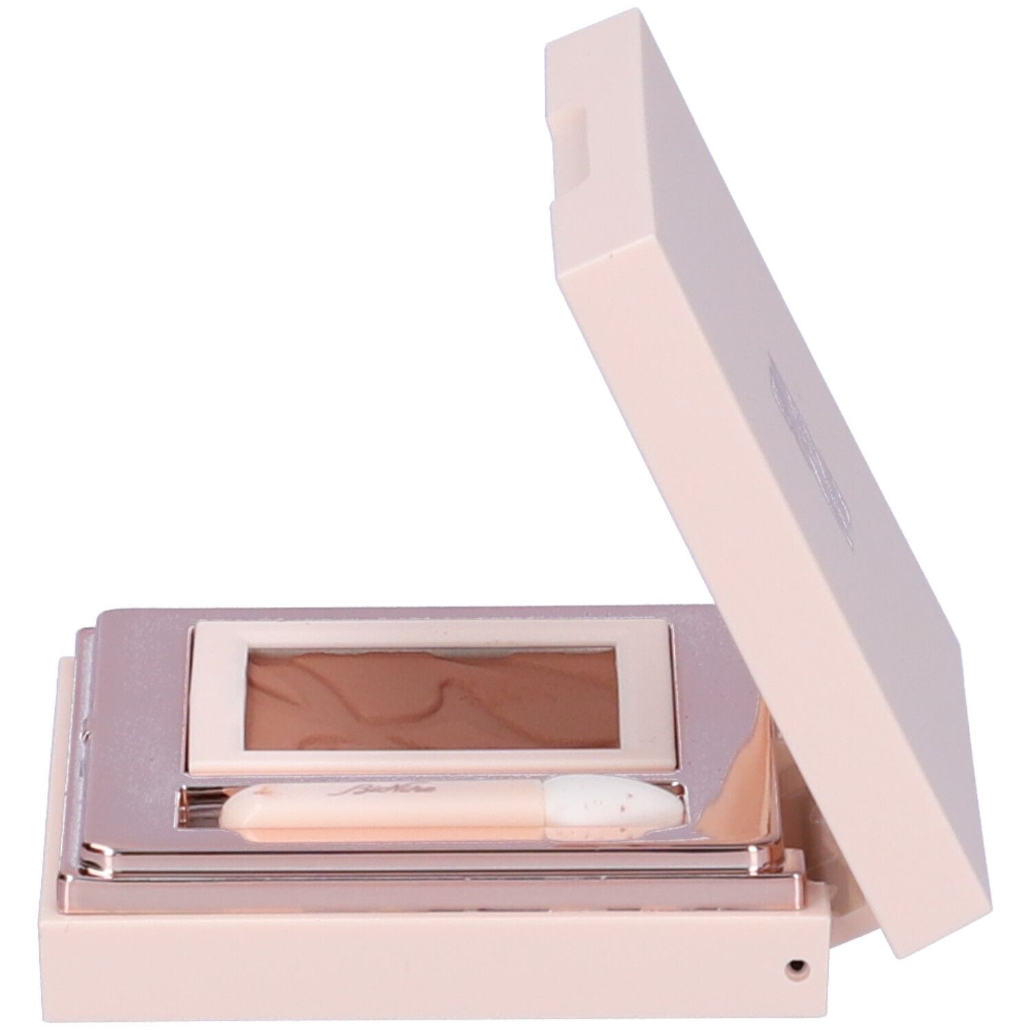 Palette ombretto rosa aperta con ombretto marrone e applicatore.
