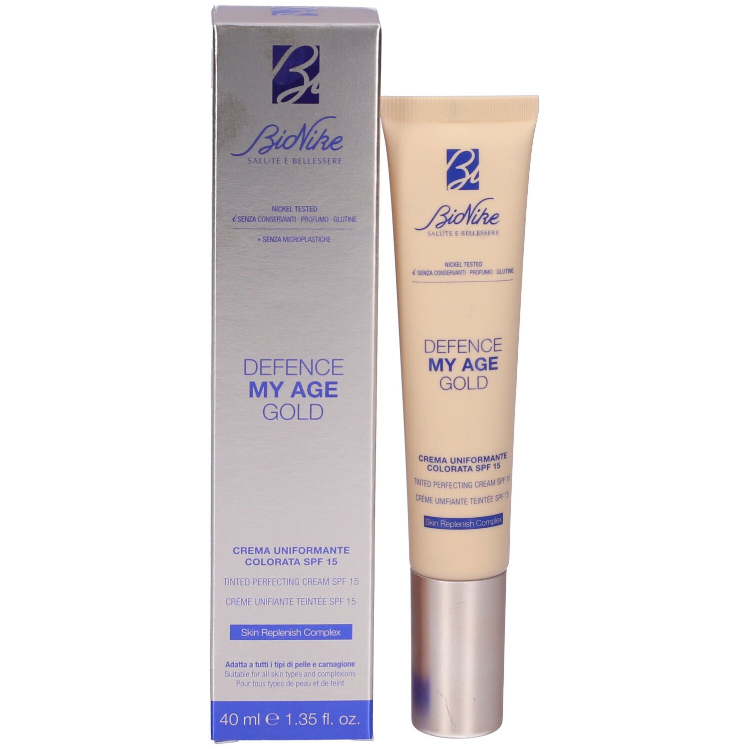 Produktverpackung mit Tube. Tube und Schachtel. Aufschrift: Bionike, Defence My Age Gold, Crema Uniformante Colorata SPF15.