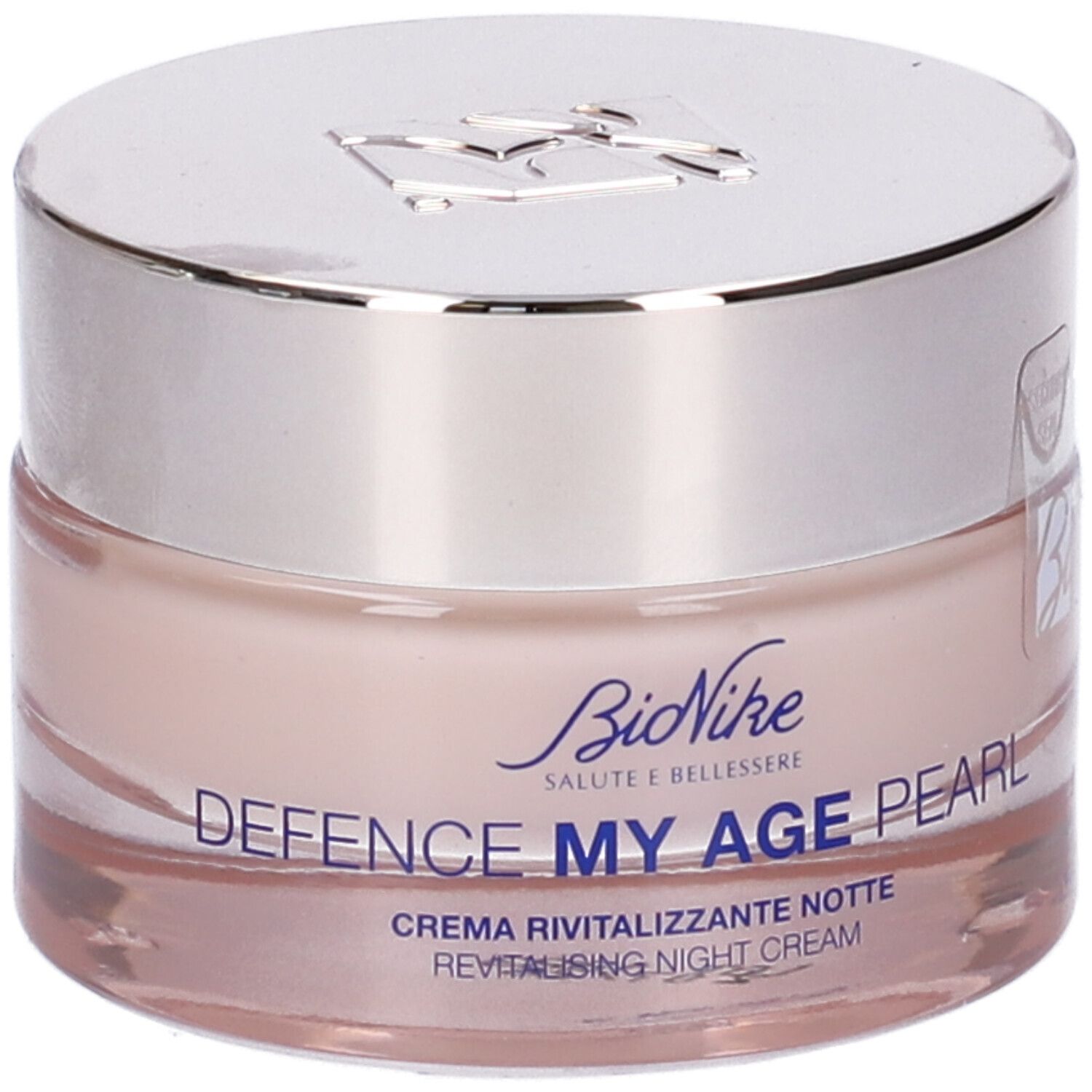 Creme-Glas mit silbernem Deckel. Aufschrift: Bionike, Defence My Age Pearl, Creme Rivitalizzante Notte.