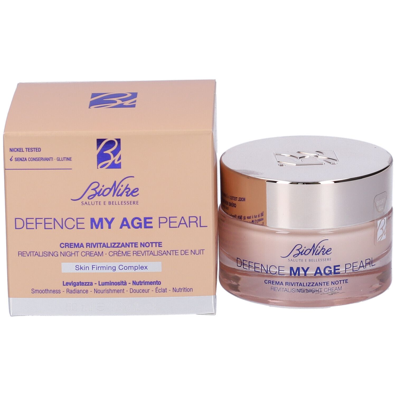 Creme-Glas und Karton. Aufschrift: Bionike, Defence My Age Pearl, Creme Rivitalizzante Notte. Skin Firming Complex.