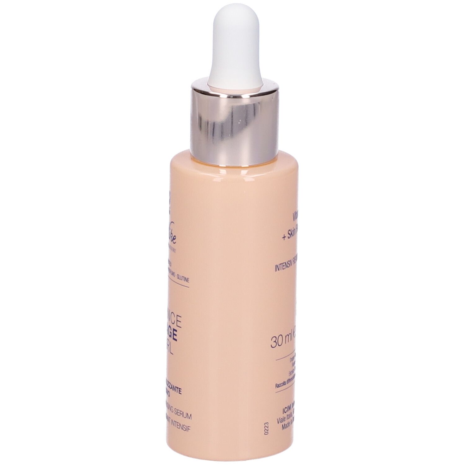 Beige Flasche mit weißem Tropfer. Aufschrift und Text. Marke Bionike.