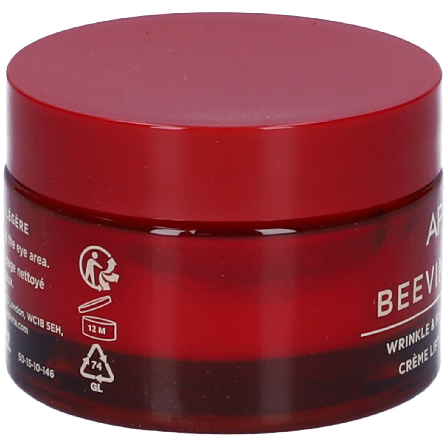 Vaso di crema rosso con coperchio rosso. Scritta: APIVITA BEEVINE ELIXIR. Testo: WRINKLE & FIRMNESS LIFT CREAM. Crème lift rides & fermeté. Testo sul retro.