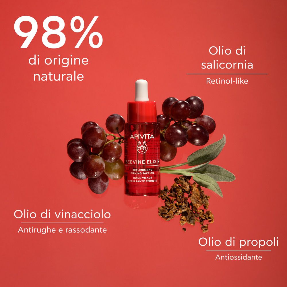Flacone rosso scuro, uva, foglie. Testo: 98% di origine naturale, Olio di salicorni, Olio di vinacciolo, Olio di propoli.