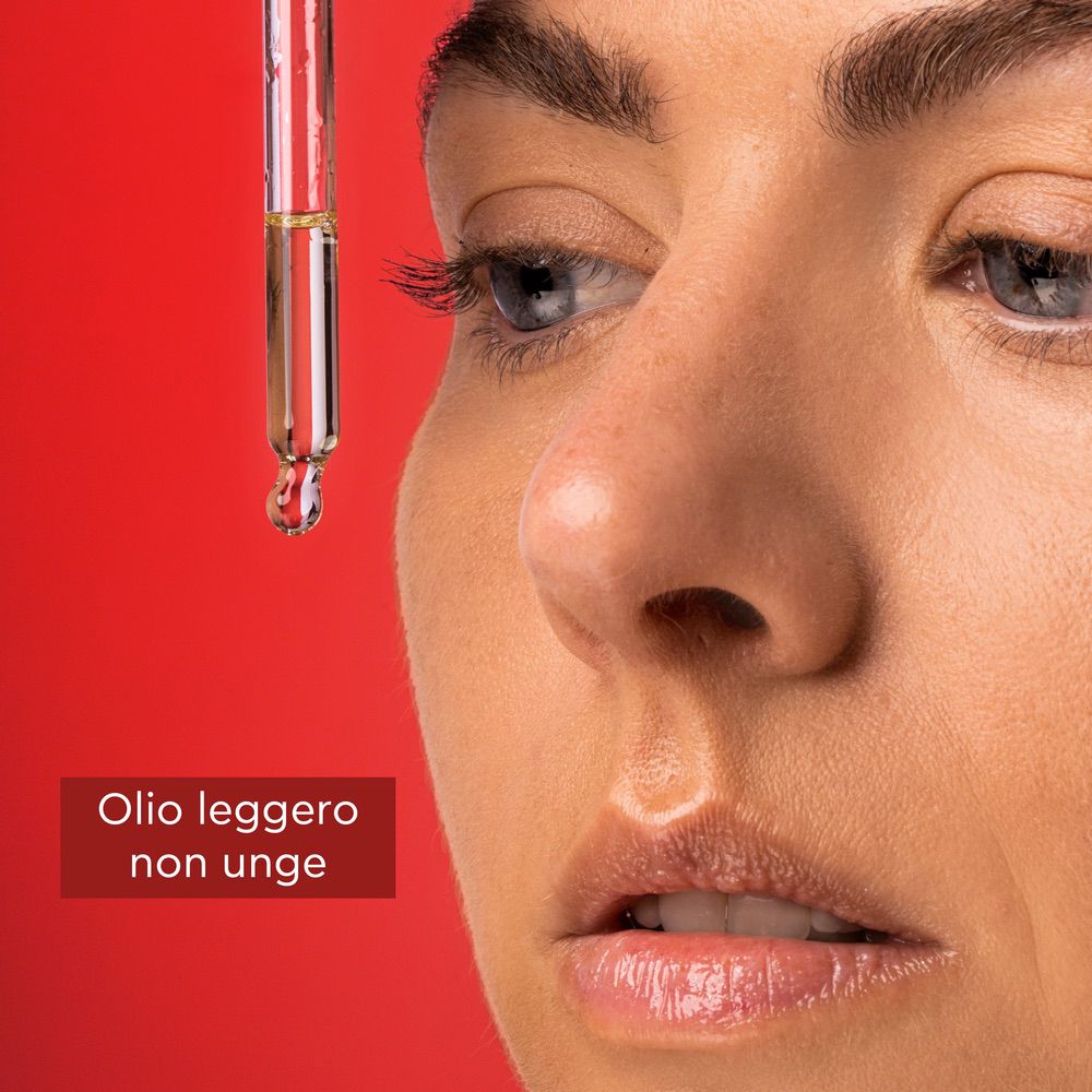 Contagocce con liquido. Testo: Olio leggero non unge.