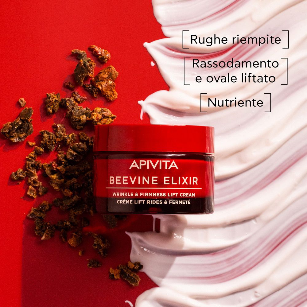 Vaso rosso APIVITA BEEVINE ELIXIR. Texture con ingredienti e testo.