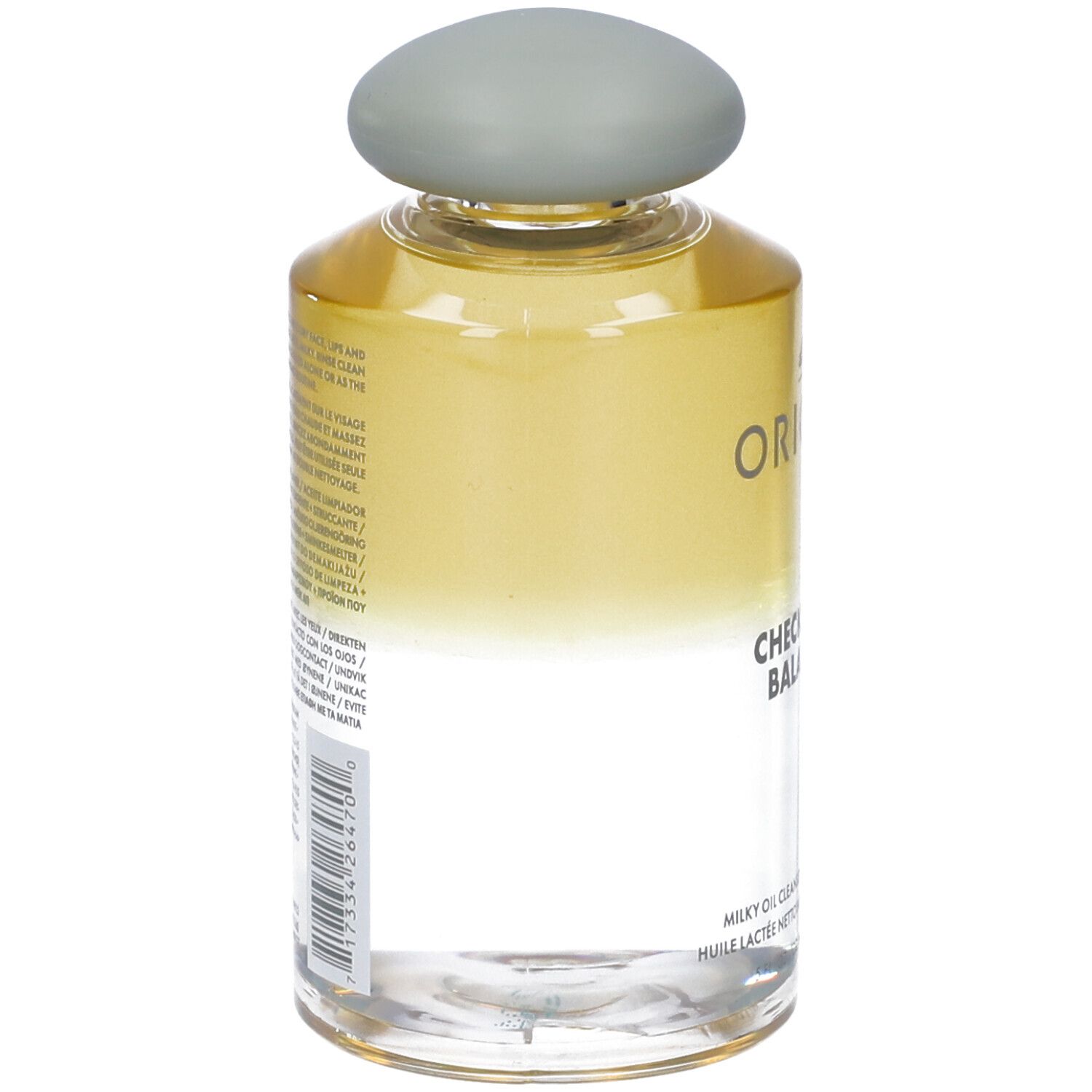 Flacone trasparente con tappo grigio. Scritta: Origins Checks and Balances. Retro con testo.