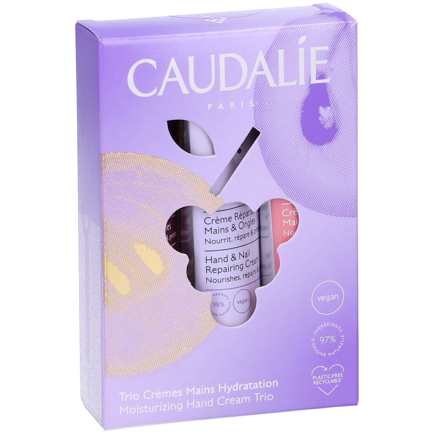 Confezione con tre creme mani. Logo Caudalie, nomi prodotti, sigillo vegano, 97% ingredienti di origine naturale.