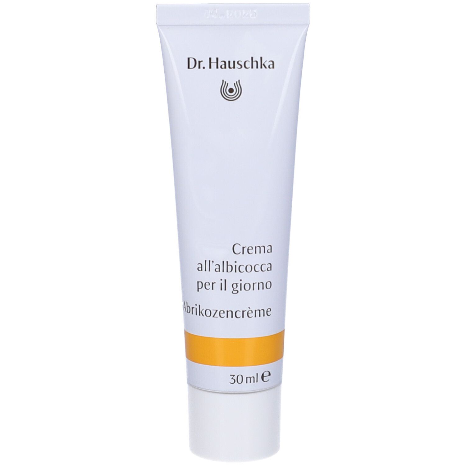 Tubo bianco con fascia gialla. Scritta: Dr. Hauschka, Crema all'albicocca per il giorno, 30 ml.