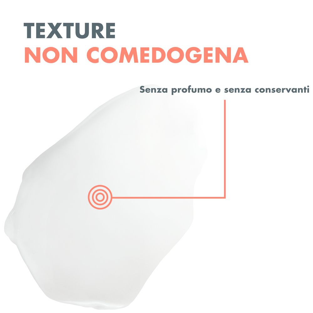 Primo piano di una crema bianca. Testo: Texture non comedogena. Senza profumo e conservanti.