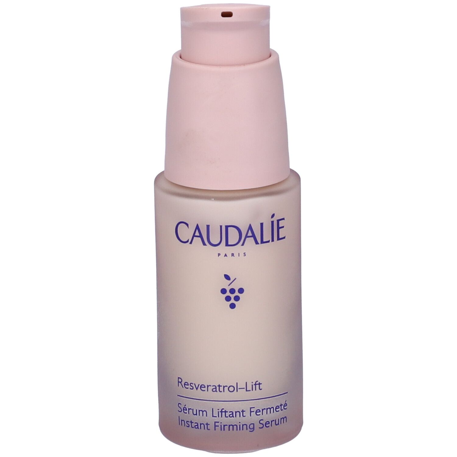 Flacone di siero Caudalie con erogatore rosa. Scritta: Caudalie, Resveratrol-Lift, Sérum Liftant Fermeté.