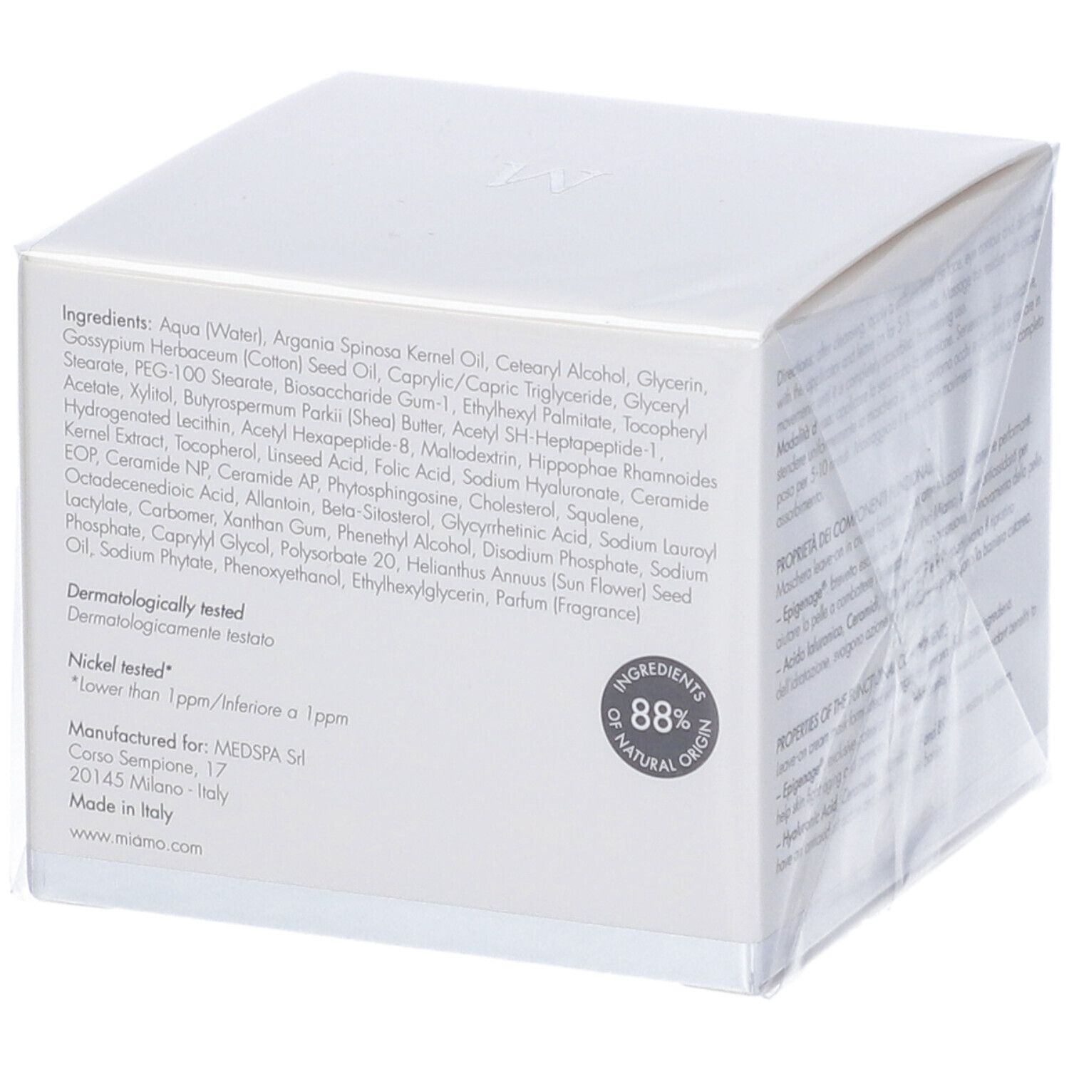 Scatola bianca con elenco ingredienti e logo. Marchio Miamo, Age Reverse Masque. 88% origine naturale.