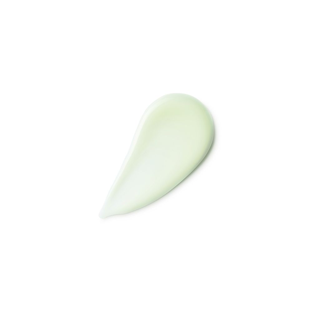 Macchia di crema verde su sfondo bianco.